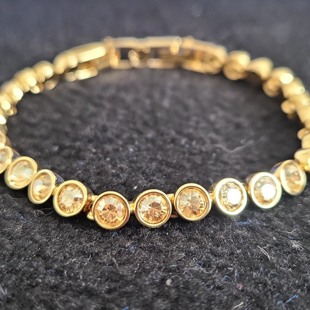 nike gold swarovski crystal